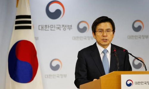After impeachment, South Korea prime minister urges calm, vigilance