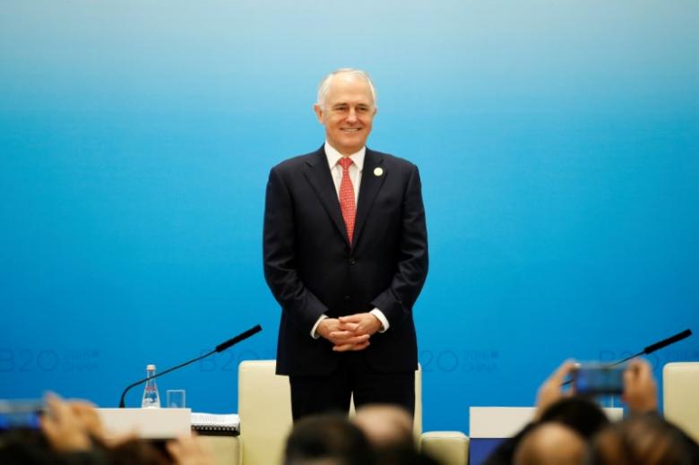 Australia's budget drips with red ink, top credit rating at risk