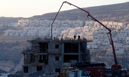Defying pressure, U.S. lets U.N. denounce Israeli settlements