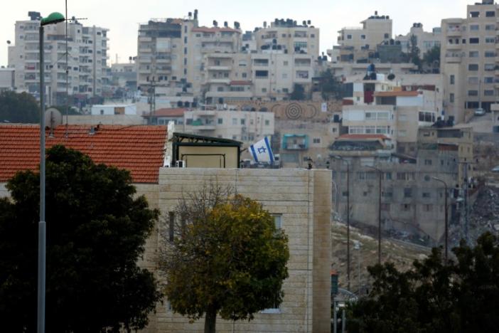 Defying pressure, US lets UN denounce Israeli settlements