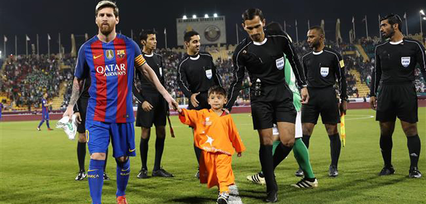 Messi meets Afghan boy famed for plastic bag shirt