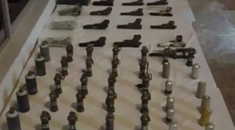 Rangers recover huge weapons cache from gangster's house in Karachi