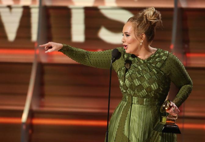 Adele sweeps Grammy awards in upset victory over Beyonce