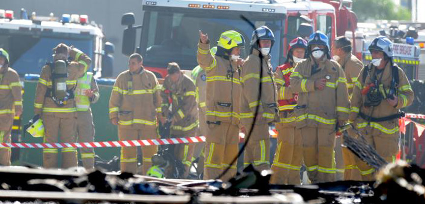 Five die as light plane crashes into mall in Australia