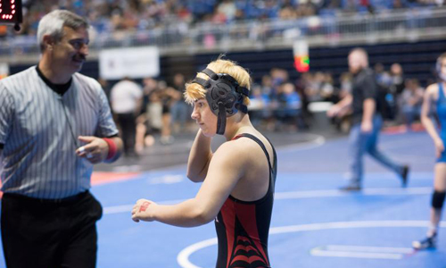 Teenage wrestler takes transgender rights to the mat in Texas championship