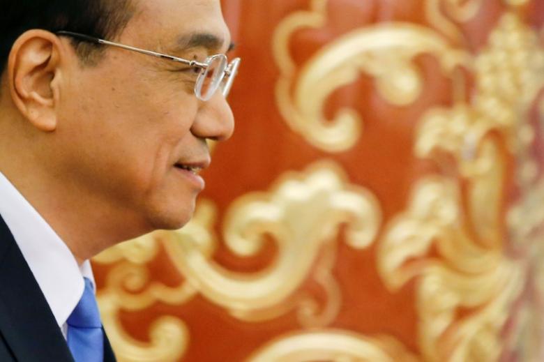China Premier Li says will further open services, industries