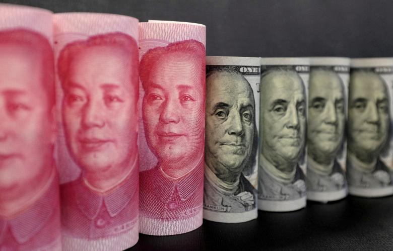 China says not devaluing yuan, urges US cooperation as Xi prepares to meet Trump