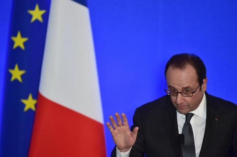 Outgoing French President Hollande says 'ultimate duty' is to prevent Le Pen victory