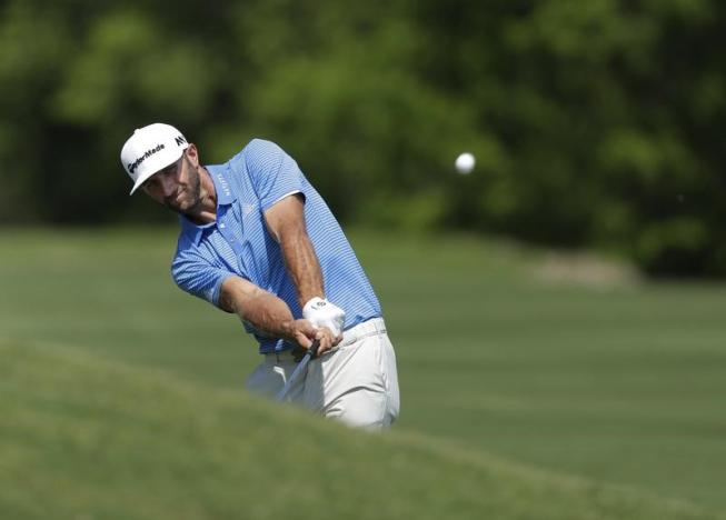 Johnson holds on to beat Rahm in Match Play final
