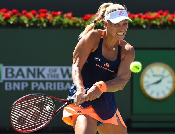 Kerber rallies to reach fourth round; Halep out