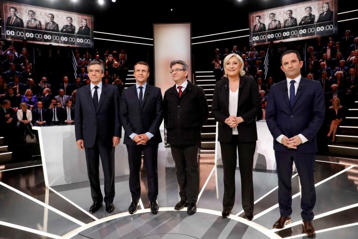 Macron seen winning French TV debate, clashes with Le Pen