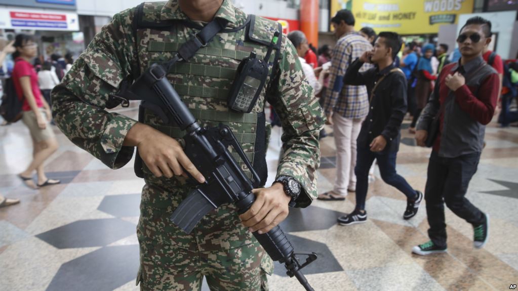Malaysia arrests five Filipinos for suspected Islamic State links