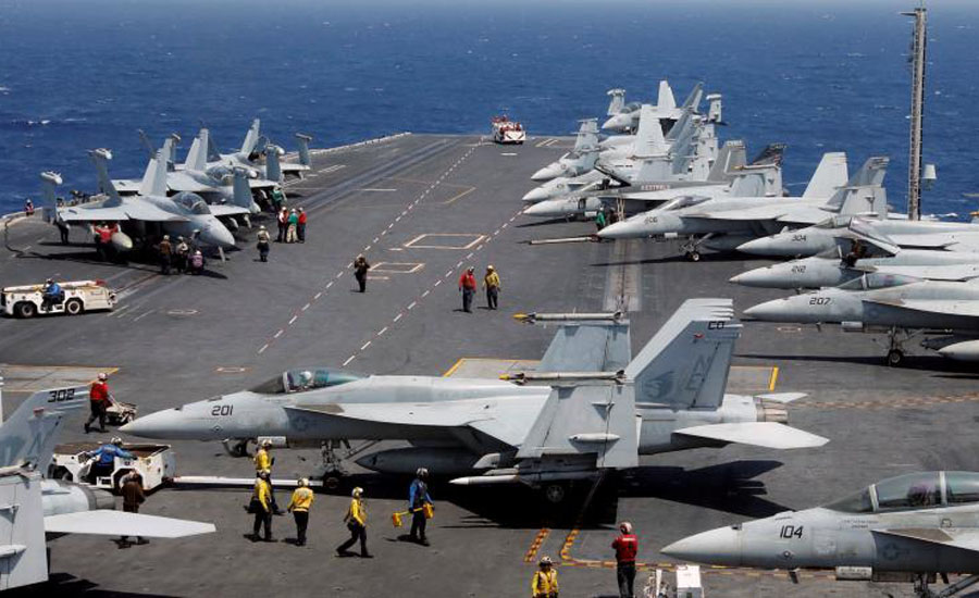 North Korea warns of 'merciless' strikes as US carrier joins South Korea drills