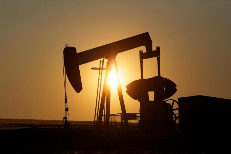 Oil up from four-month lows, inventories curb recovery