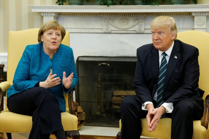 Trump, Merkel hold first face-to-face meeting at White House