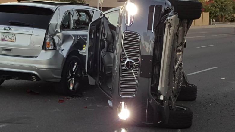 Uber suspends self-driving car program after Arizona crash