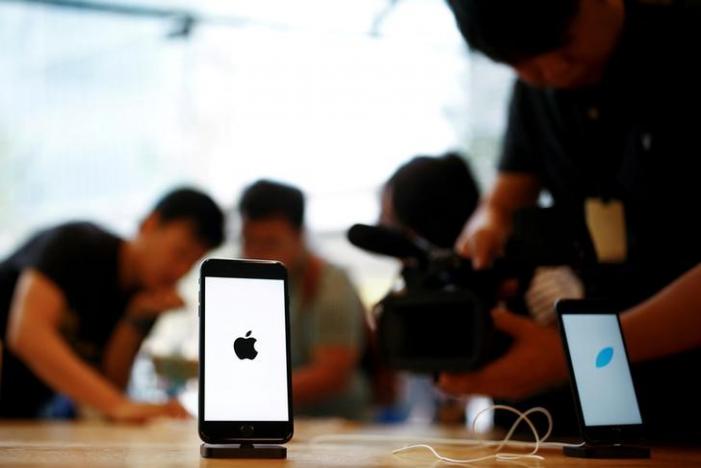 Apple posts surprise dip in iPhone sales, shares fall