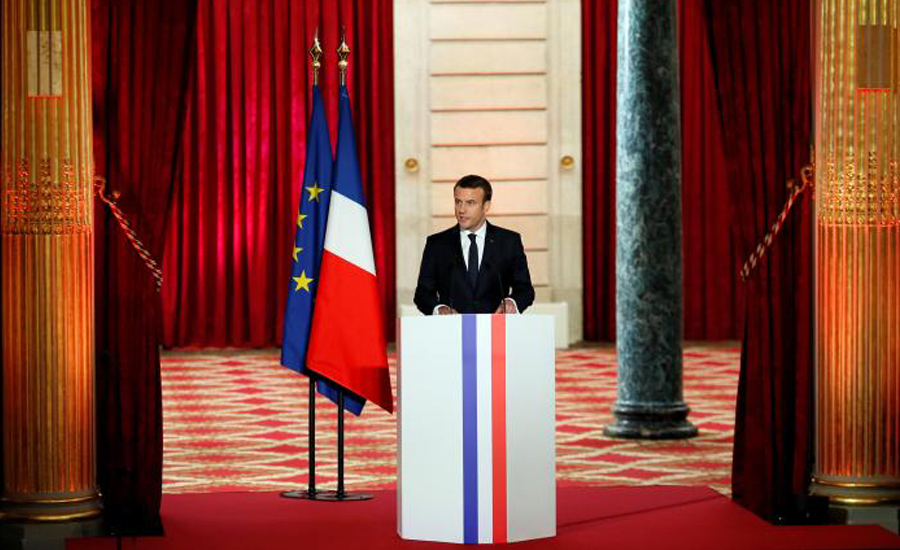France's Macron takes power, vows to heal division, restore global status