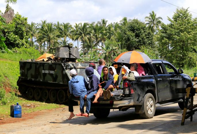 Philippines deploys helicopters in battle to retake city from Islamist rebels