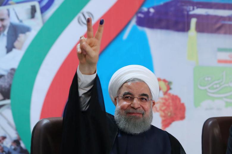In tight Iran race, outspoken Rouhani breaks political taboos