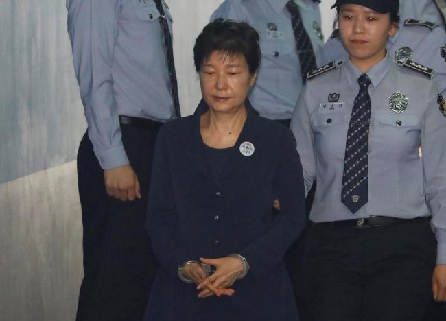 South Korea's ex-leader Park abused power to gain bribes, prosecutor tells court