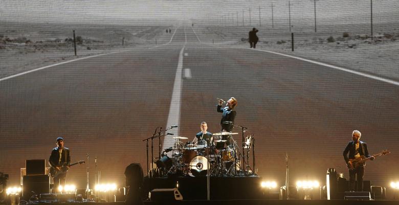 U2 scans new political landscape at U.S. 'Joshua Tree' tour debut