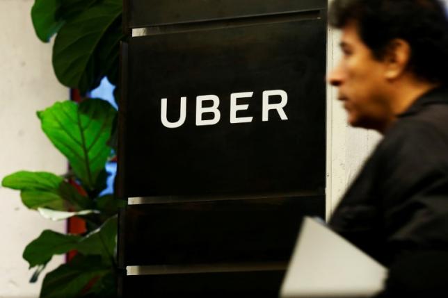Uber's finance head leaves; company's quarterly loss narrows