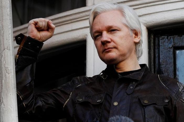 Sweden drops Assange investigation, UK police says he still faces arrest