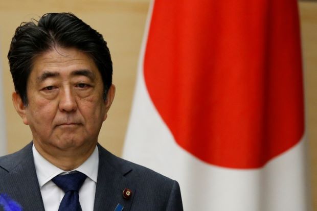 Japan PM Abe denies favours for friend amid falling support