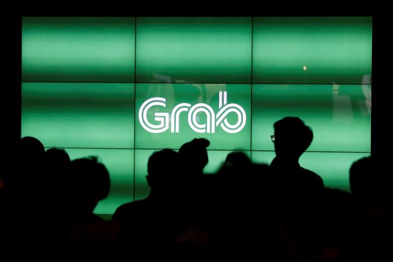 Grab, Uber's SEAsia rival, to raise $2.5 billion from Didi, SoftBank, others