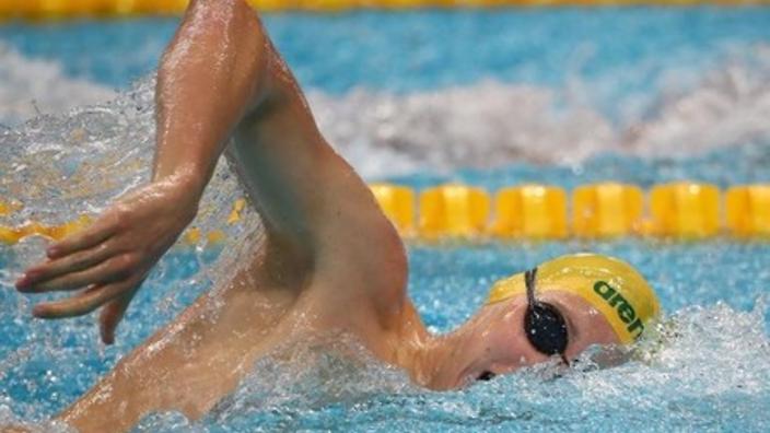 Olympic champion Horton battles into 400 freestyle final