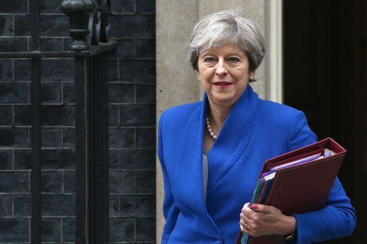 Britain's May to stay as PM until at least 2020, close ally predicts