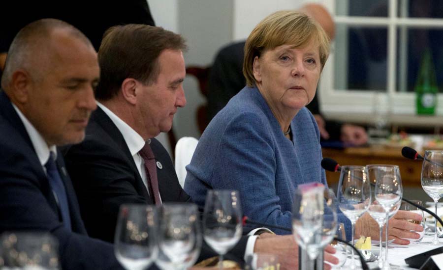 Macron's EU vision will bolster Franco-German axis: Merkel