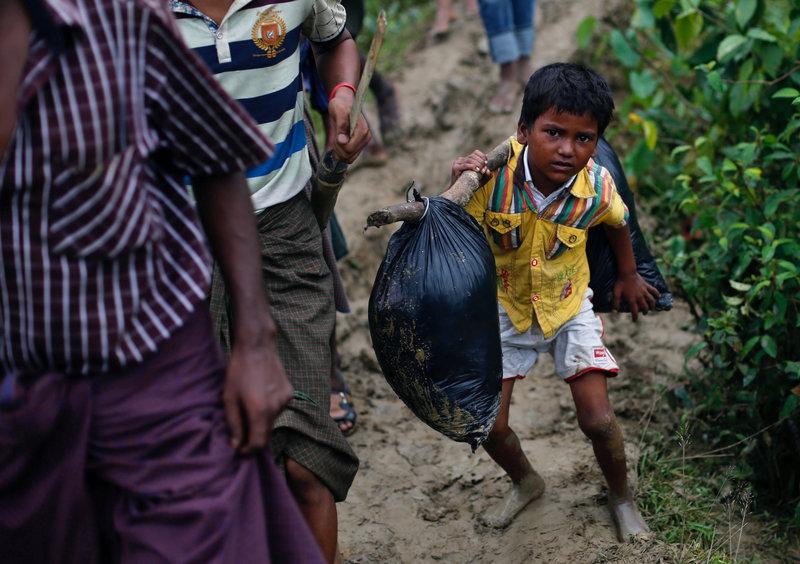 Rohingya refugees tell of new violence; call for Myanmar sanctions