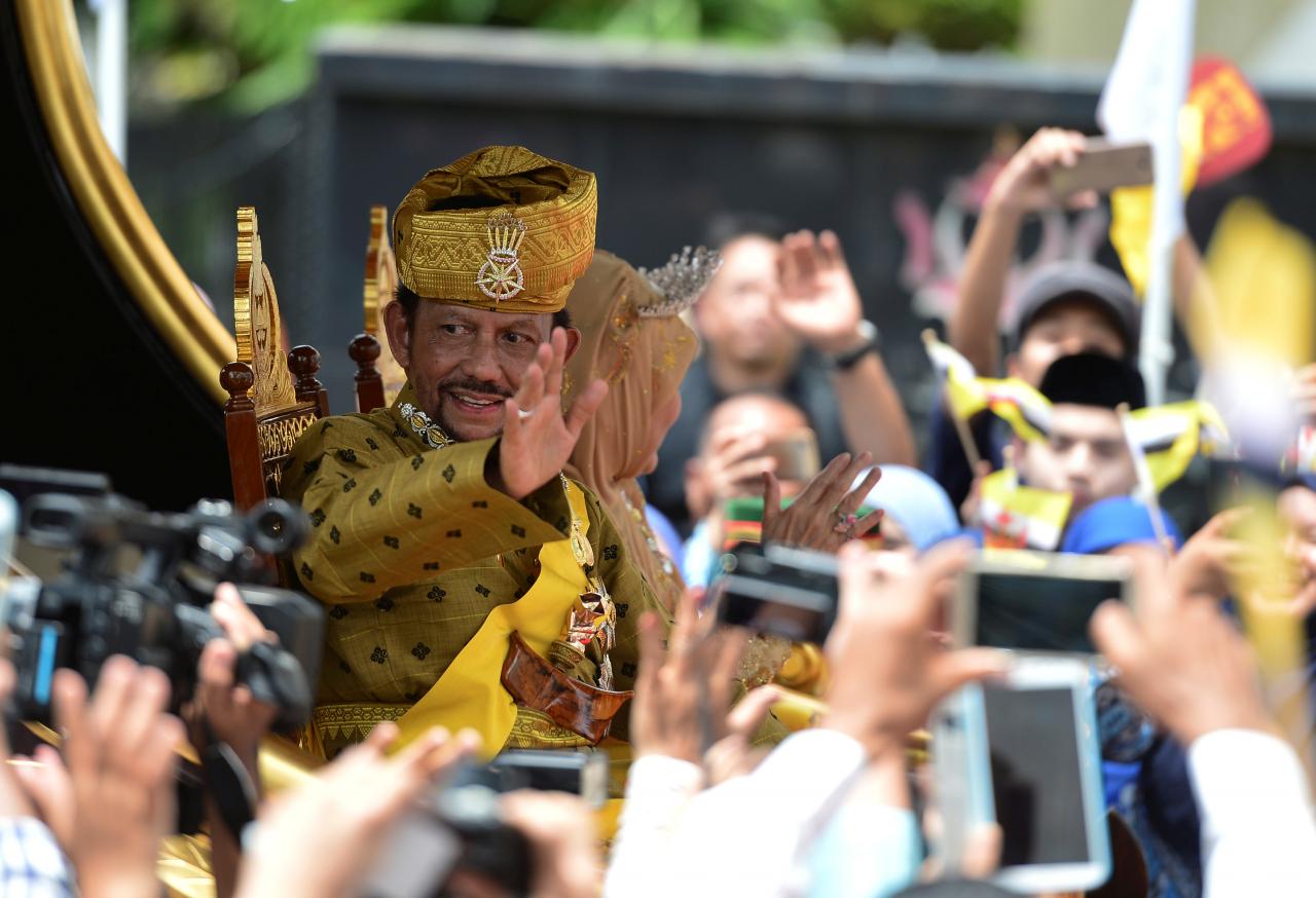 Your gilded chariot awaits: Brunei sultan celebrates 50 years in power