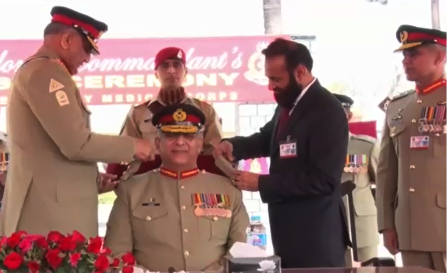 COAS pins badges of AMC Col Commandant on Lt Gen Zahid Hamid