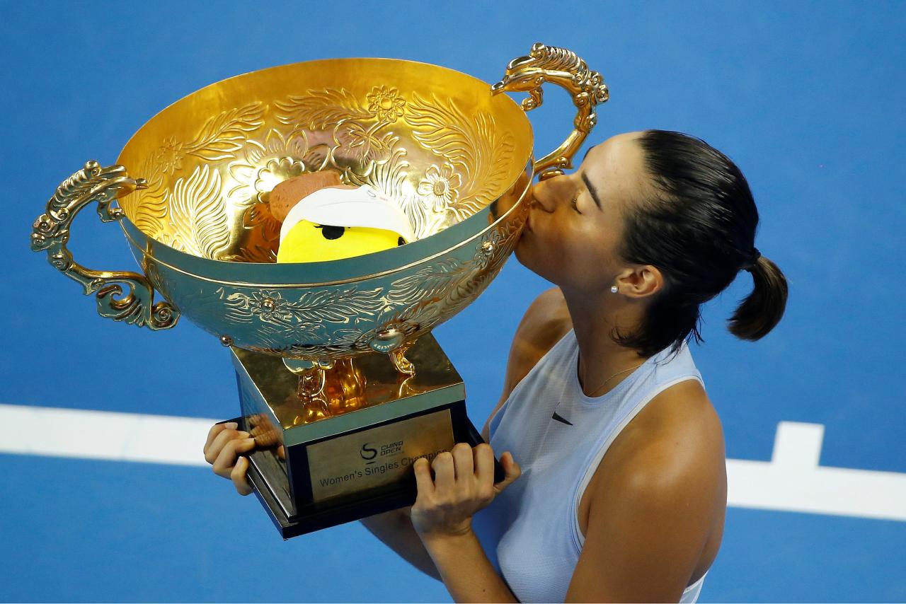 Garcia pulls off Halep upset to win China Open final