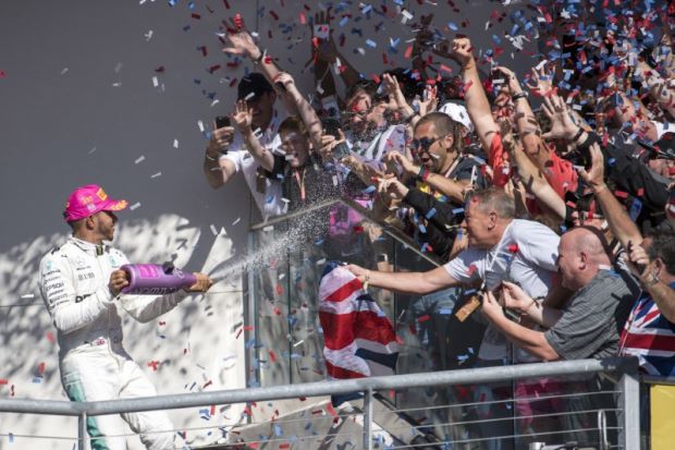 Hamilton wins US GP but made to wait for title