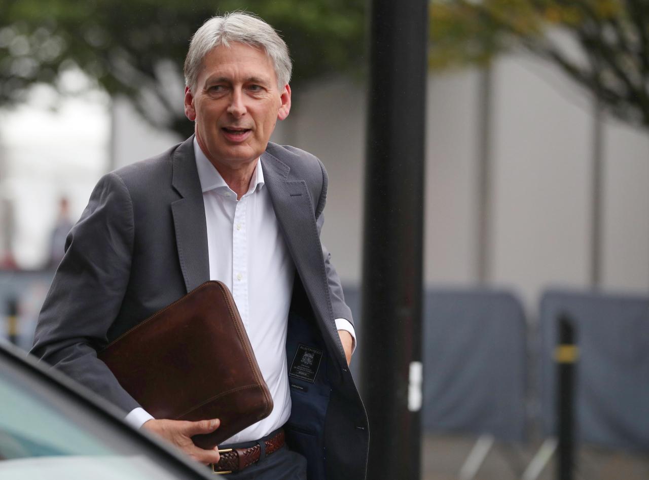 'Our economy is not broken,' says Hammond, defending capitalism