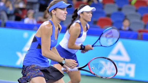 Retiring Hingis secures year-end top ranking in doubles