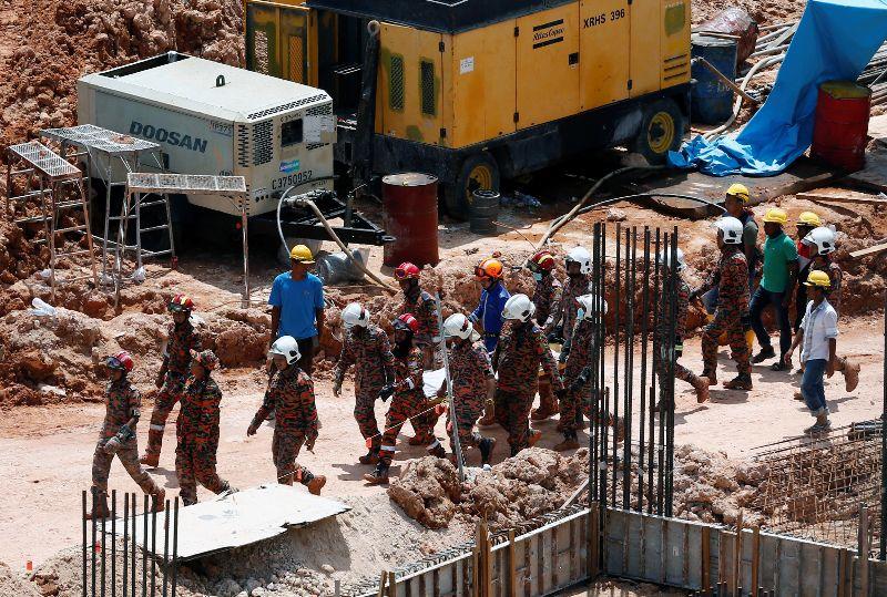 Death toll from Malaysia construction site landslide at 11