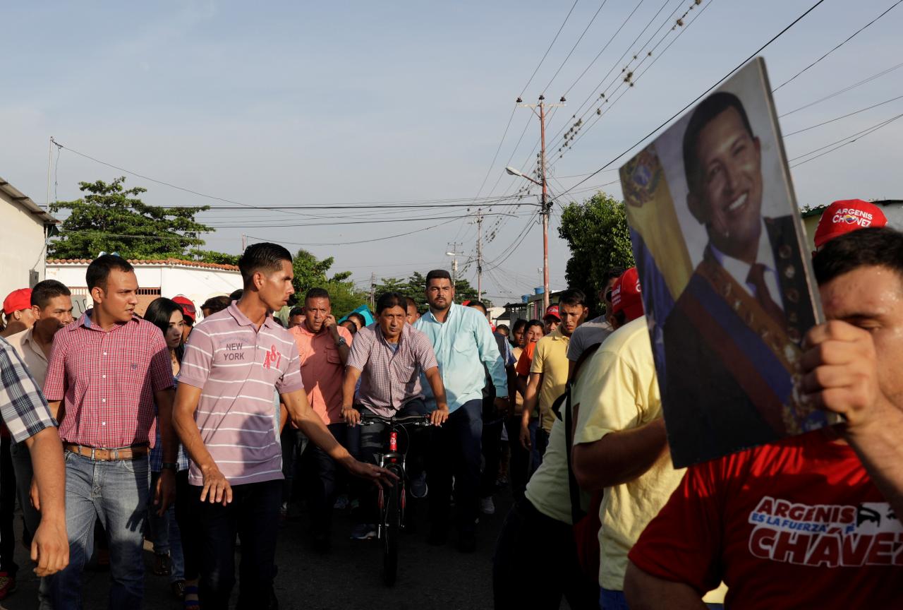 After bloodshed, Venezuelan government and foes battle for votes