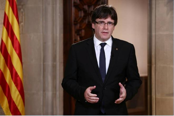 Spain issues arrest warrant for ousted Catalan leader