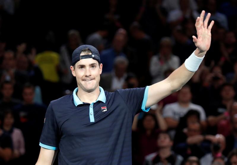 Isner keeps Tour finals hopes alive as Nadal withdraws in Paris