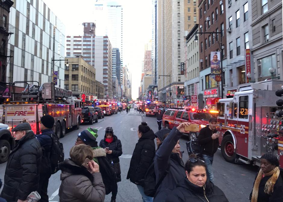 Explosion rocks New York commuter hub, suspect in custody