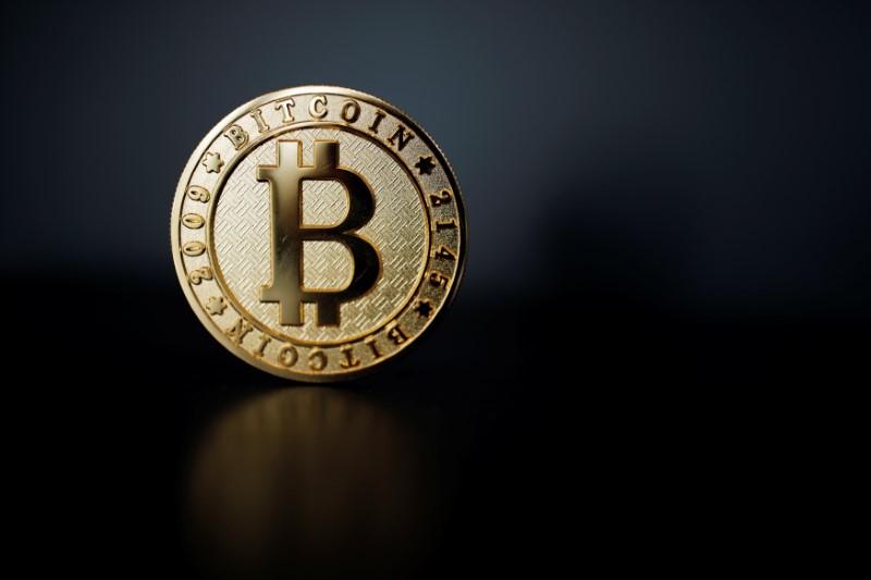 Bitcoin pauses below record peak; gained 55 percent in November