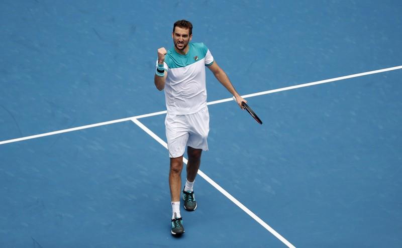 Cilic reaches quarters, celebrates 100th grand slam win