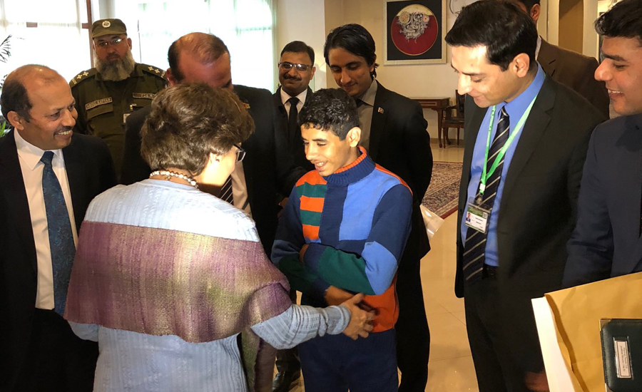 Pakistan reunites Afghan boy with his family