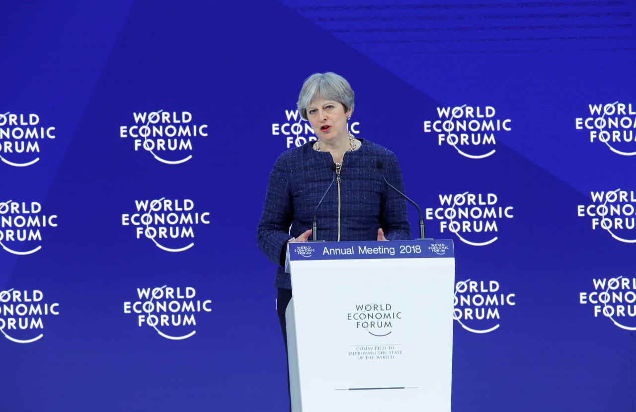 UK's May promises frank discussions with China amid dash for trade