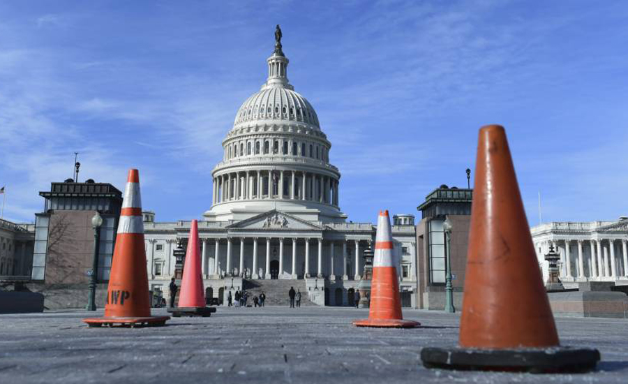 One year on, Trump leads divided US into government shutdown